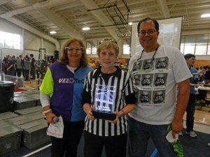 Carol Perrotto (center) presented award by Rosanne Danner, FRC 316 and John Larock, FRC 365