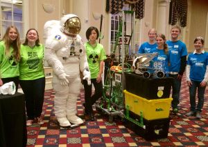 FSR students pose alongside ILC space suit at 2016 DE STEM Council Awards Ceremony